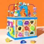 6 in 1 Wooden Motor Skills Cube with Shape Sorter Learning Clock Gear Game Montessori Toy Fine Motor Skills Wooden Activity Cube